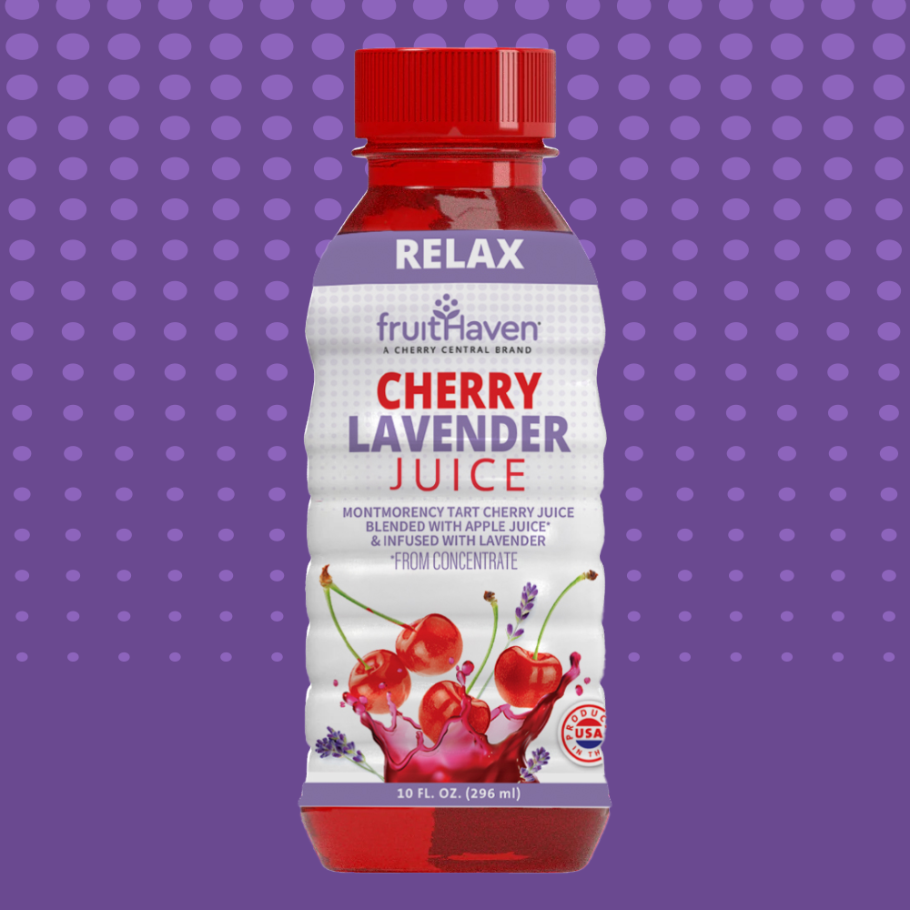 Bottle of fruitHaven Cherry Lavender Juice on a purple polka dot background
